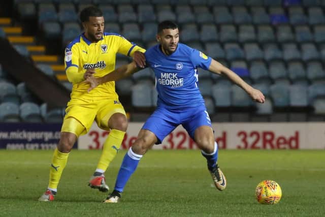 Colin Daniel (right) in action for Posh.