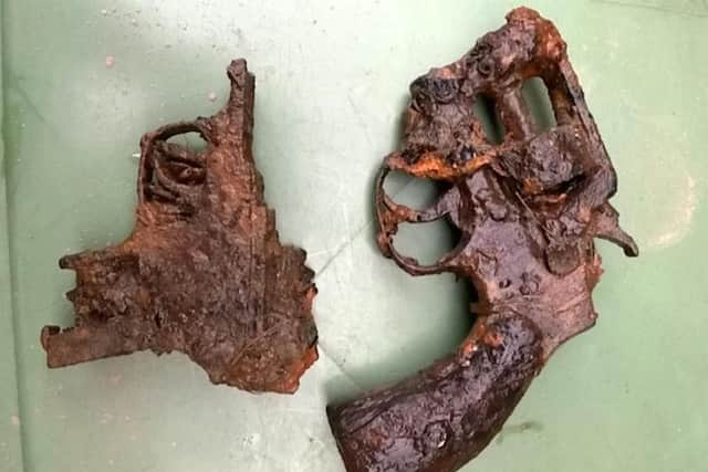 Two of the antique guns pulled from the River Nene. Photo: SWNS