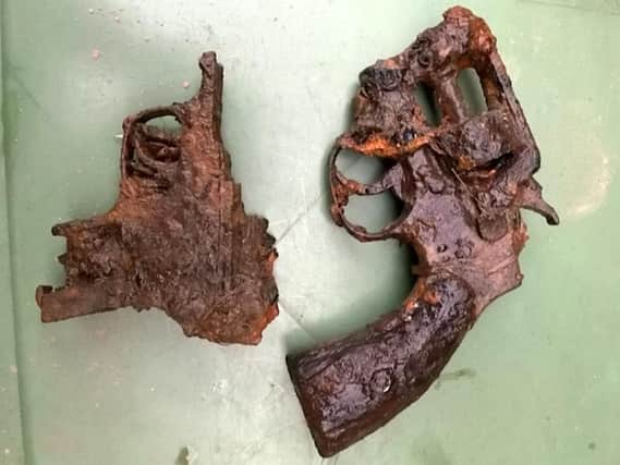 Two of the antique guns pulled from the River Nene. Photo: SWNS