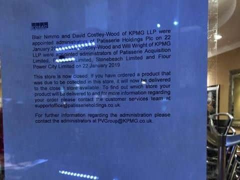 The notice on the window of Patisserie Valerie in Peterborough's Cathedral Square