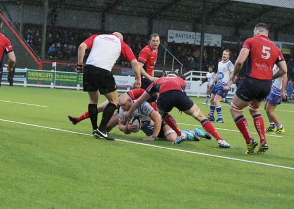 Marius Andrijauskas scores the  Lions try. Picture: Mick Sutterby