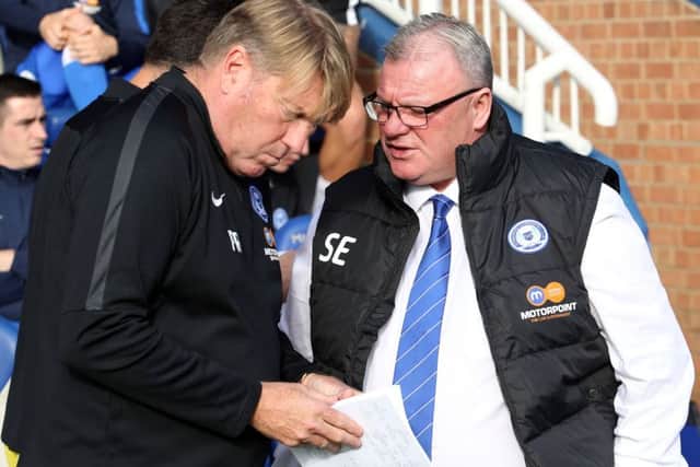 Posh manager Steve Evans and his assistant Paul Raynor (left) who have both been sacked.