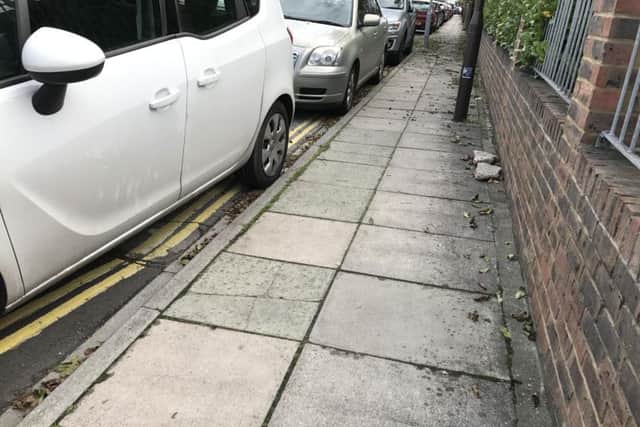 A car parked on double yellow lines