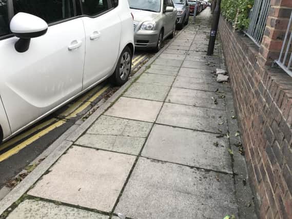 A car parked on double yellow lines