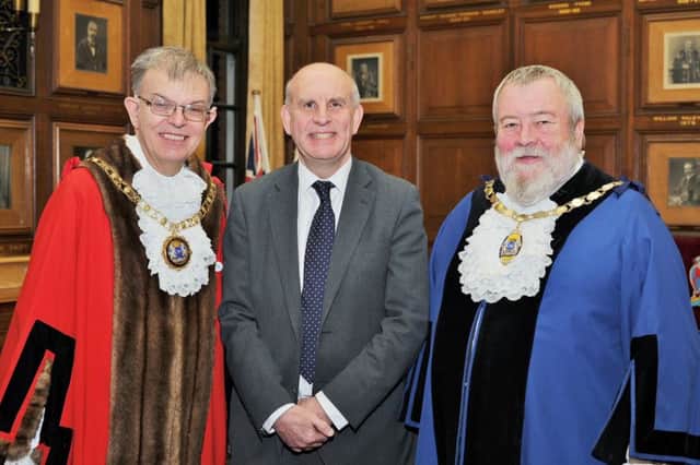 Mayor of Peterborough Coun. Chris Ash and Deputy Mayor Coun. John Fox with new Alderman John Peach EMN-190126-161506009