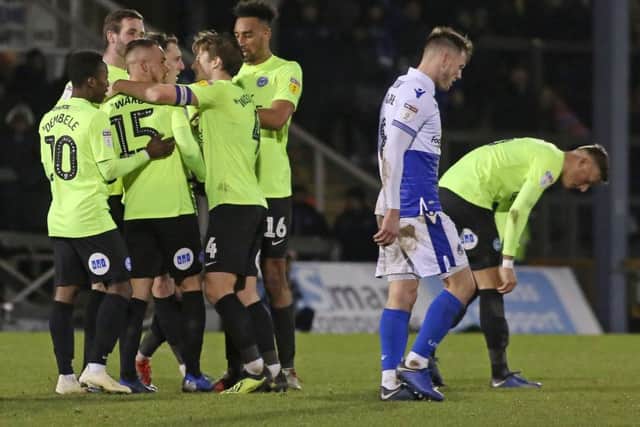 Joe Ward is congratulated after scoring the Posh equaliser at Bristol Rovers.