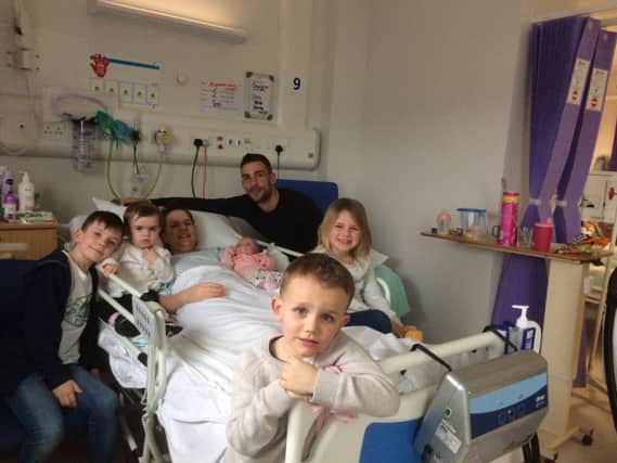 Charlotte and her family in hospital