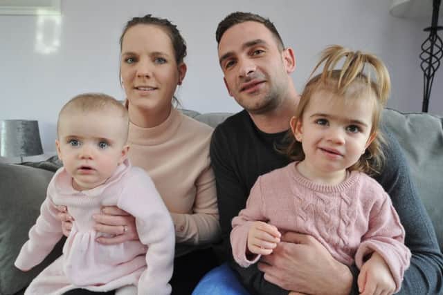 Sepsis victim Charlotte Pennells from Deeping st James with her one year-old daughter Darcey Pennells-Merrill ,  daughter Honey Pennells-Merrill (2) and husband Phil Merrill EMN-190129-125400009
