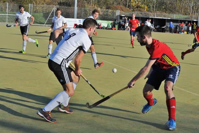 City of Peterborough 1sts in National League action (red).