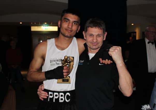 First round winner Imran Aref with coach Paul Goode.