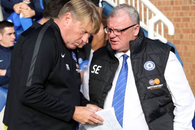 Former Posh manager Steve Evans (left) and his assistant Paul Raynor.