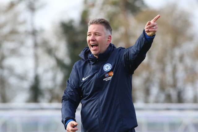 Posh boss Darren Ferguson points the way to the play-offs.