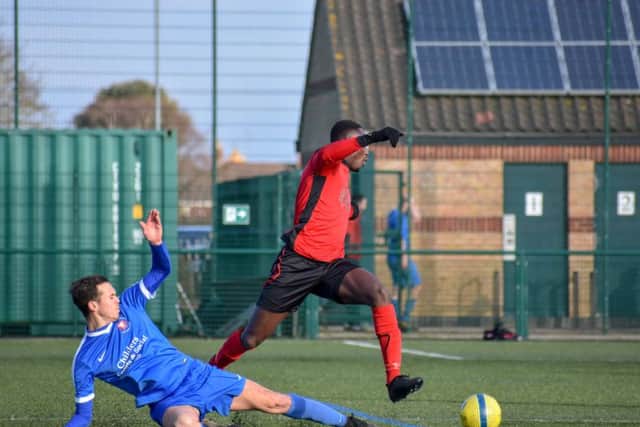 Action from Netherton United's 2-2 draw with Whittlesey Athletic (blue) at the Grange. Photo: James Richardson.