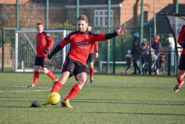 Michael Fox scores for Netherton against Whittlesey. Photo: James Richardson.
