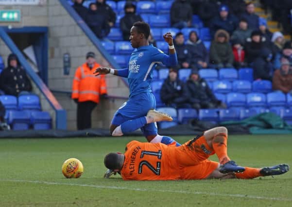 Posh winger Siriki Dembele picked up an injury in this incident in the game against Plymouth. Photo: Joe Dent/theposh.com.