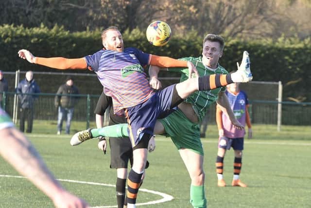 Action from Yaxley v Bromsgrove Sporting (green). Photo: David Lowndes.