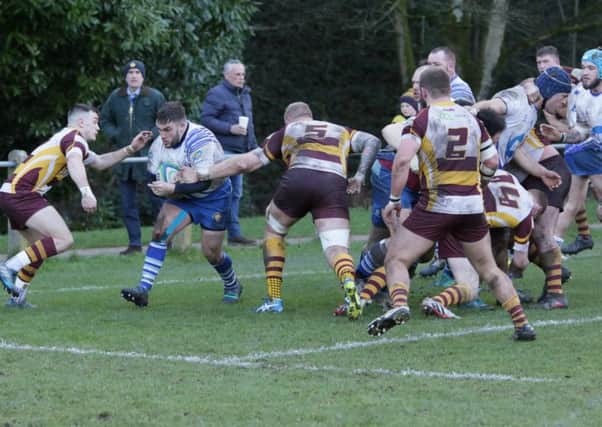 Jack Lewis on the run for the Lions against Huddersfield. Picture: Mick Sutterby