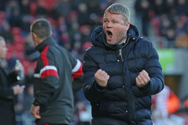 Doncaster manager Grant McCann's reaction to taking the lead against Posh. Photo: Joe Dent/theposh.com.
