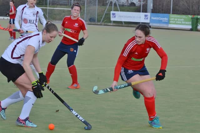 City of Peterborough Ladies (red) in action during their win over Wapping.  Photo: David Lowndes.