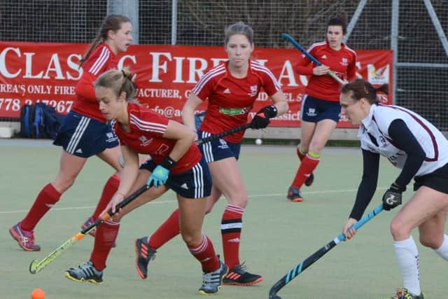 Action from City of Peterborough Ladies 2, Wapping 1. Photo: David Lowndes.