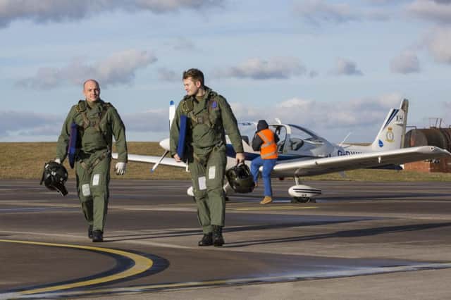 Flt Lt Latchem and a student from 16 Sqn return from a sortie