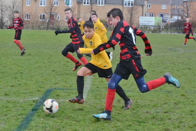 Action from the Under 13 game between Park Farm Pumas Red and Glinton and Northborough Navy.