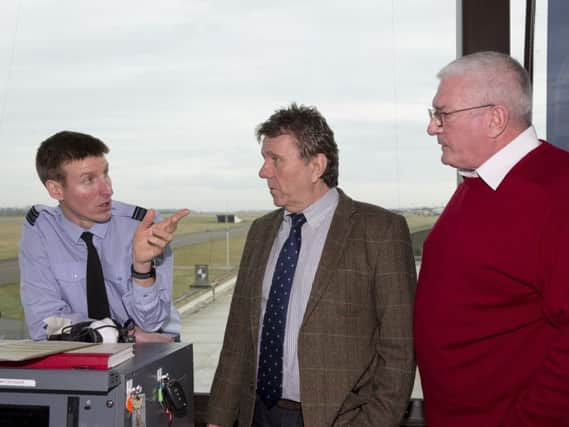 Squadron Leader Tom Hammond, Simon Robertson and Iain Cooper in conversation at Air Traffic Control