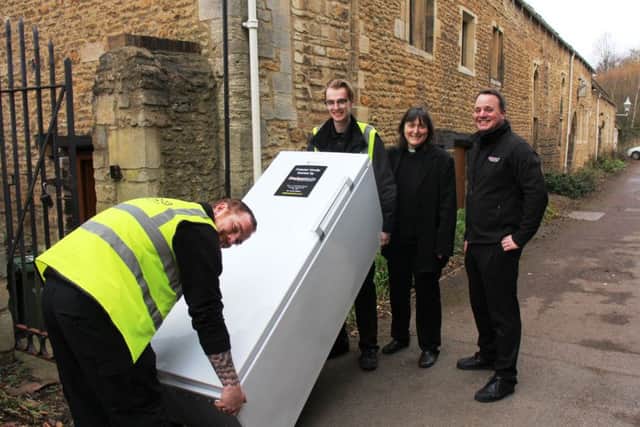 Canon Sarah Brown with Rob Goldsmith and members of the Hughes delivery team