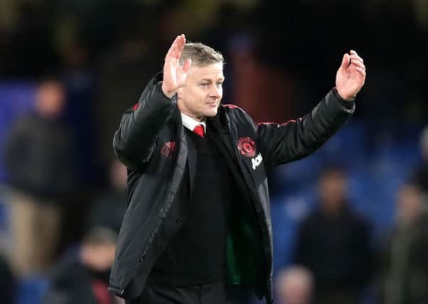 Manchester United and manager Ole Gunnar Solksjaer are lying in wait for Liverpool.