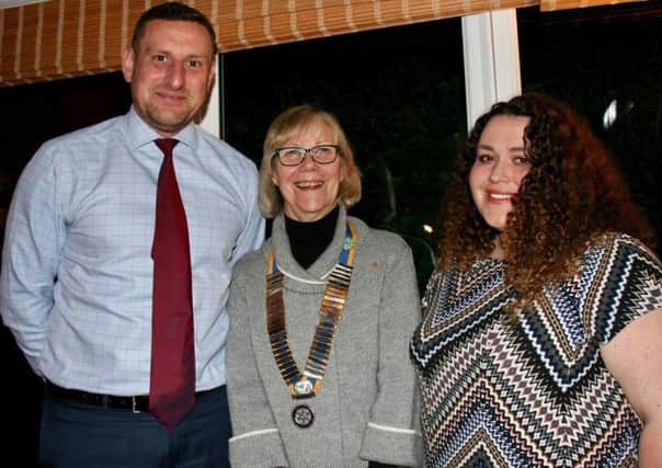 President of the Rotary Club of the Deepings Jenny Spratt, centre, with
head teacher James Husbands and Nicola Hill of Willoughby School