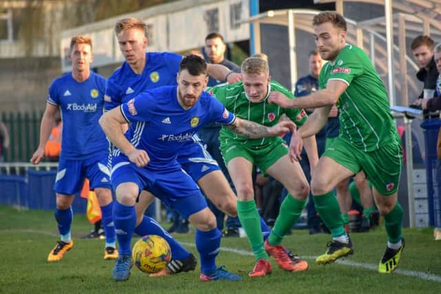 Josh Moreman on the ball for Peterborough Sports in the game against Bromsgrove Sporting. Photo: James Richardson.