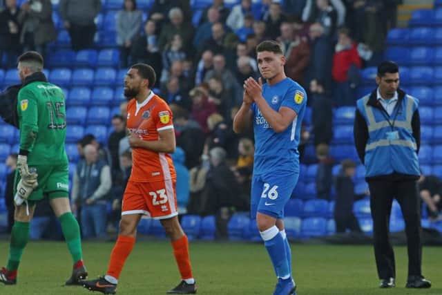 Mathew Stevens applauds the Posh fans after the Shrewsbury match. Photo: Joe Dent/theposh.com.