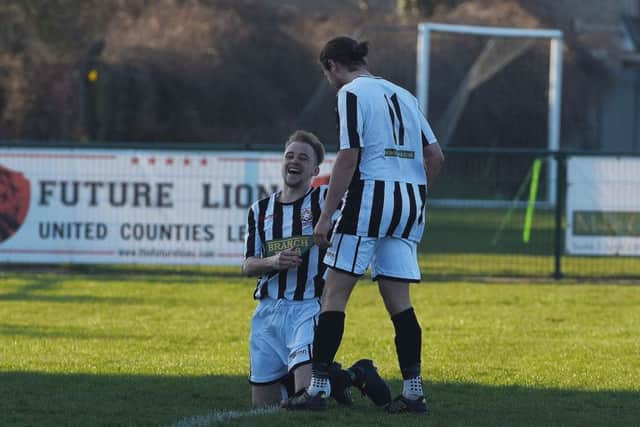 Sam Wilson of Peterborough Northern Star celebrates scoring against Holbeach United with team mate Kieron Blanchard. Photo: Chantelle McDonald. @cmcdphotos
