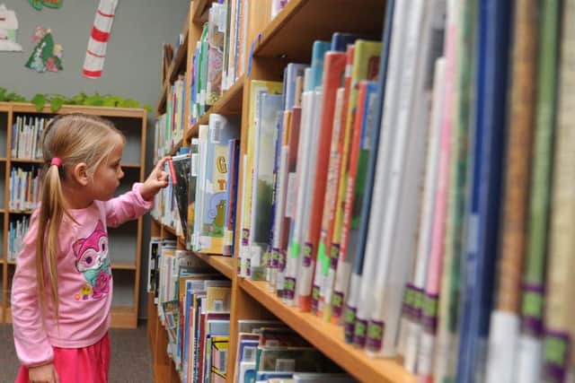 Can you become a reading buddy at a Peterborough school?