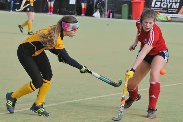 Action from City of Peterborough Ladies thirds (red) against March in the East League. Photo: David Lowndes.