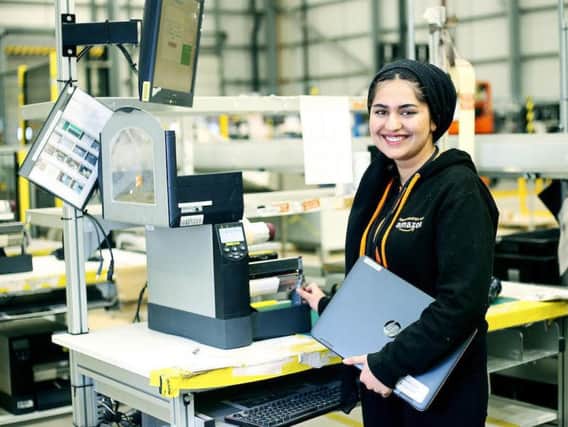 Sunha Zulfiqa at work at Amazon in Peterborough.