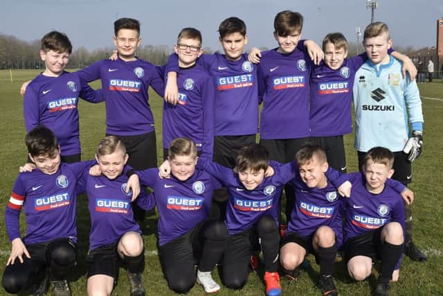 Pictured are Riverside Under 12s before their 3-1 defeat by table-toppers Glinton and Northborough Navy. They are Kamia Javaid, Ryan Mulhall, Matthew Stunt, Joshua Moore, Jakub Urbanik, Piotr Bialoglowski, Luca Smith, Isaac Heppell, Lewis Scott, Maxwell Kelley, Rocco Cipriano, Mateusz Zakrzewski and Luca Maselli.