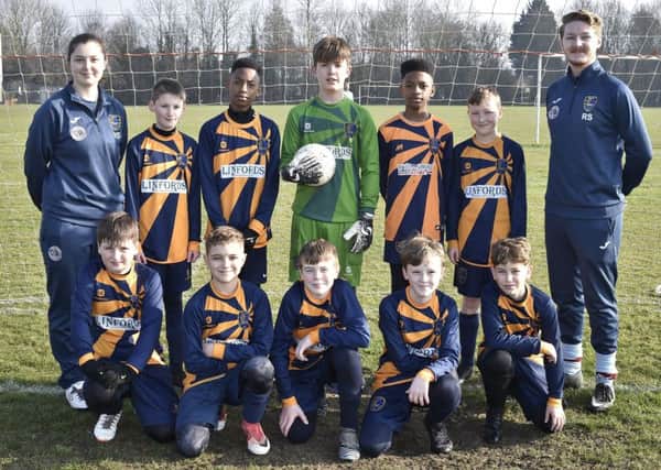 Pictured are Glinton & Northborough Navy Under 12s before their 3-1 win over Riverside. From the left are, back, Holly Simkins, Archie Crane, Dandre Butler, Stanislaw Szewczuk, Devonte Butler, Rhys Ingram, Rowan Stansfield, front, Jack Yeardley, Charlie Dobson, Luke Hallabrin, Archie Bointon and Caden Papworth.