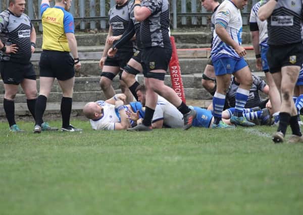 Jack Lewis scores the Lions try at Otley. Picture: Mick Sutterby