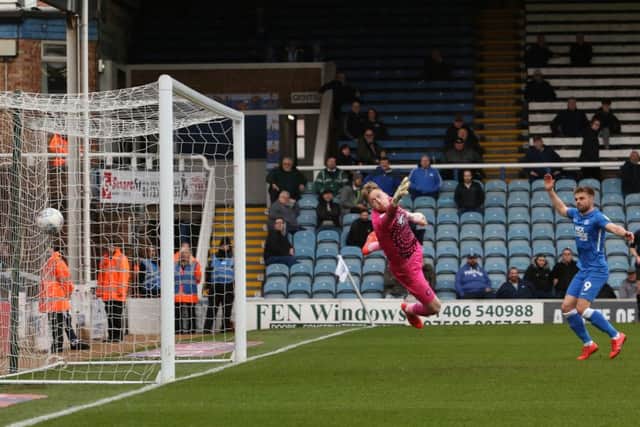 Ryan Allsop of Wycombe Wanderers can't prevent Marcus Maddison of Peterborough United (not in picture) from scoring his side's third goal of the game. Picture: Joe Dent
