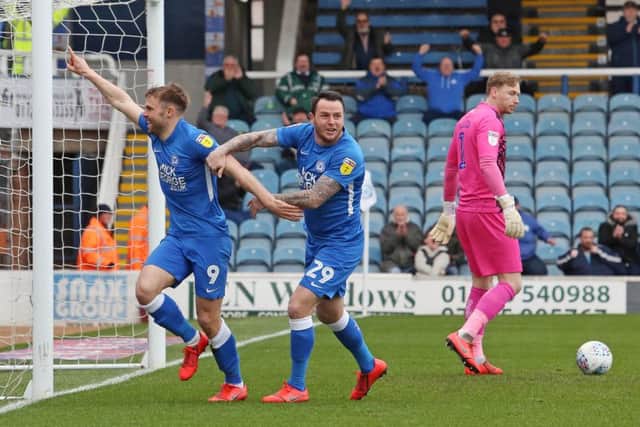 Matt Godden of Peterborough United celebrates scoring the opening goal of the game. Picture: Joe Dent