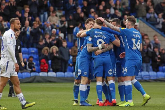 Marcus Maddison of Peterborough United celebrates scoring his second goal of the game with team-mates - Mandatory by-line: Joe Dent/JMP - 02/03/2019 - FOOTBALL - ABAX Stadium - Peterborough, England - Peterborough United v Wycombe Wanderers - Sky Bet League One