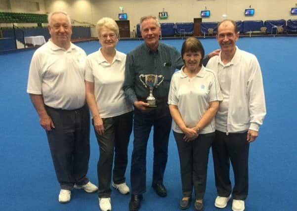 Northants Bowling Federation group organiser Dick Ford is pictured with the Top Team trophy awarded to the county at the annual English Bowling Federation Bowls Week at Potters Resort and the Stamford rink that reached the final. They are from the left Martin and Elizabeth Wallace, Shirley and John Suffling.