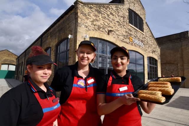 Amity Pullar,Sophie Yates (manager) and Haleema Mahmoud outside new Greggs store at Fletton Quays