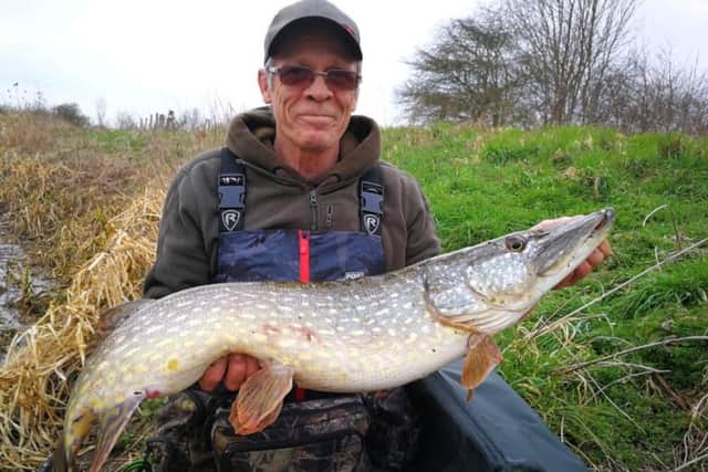 Carl Street with a cracking 18lb pike.