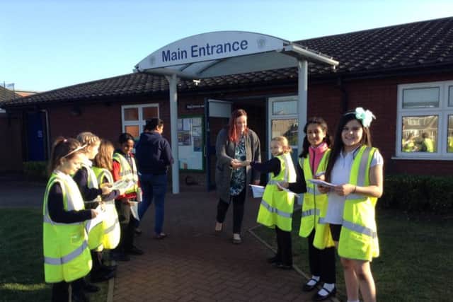 Pupils at Longthorpe Primary School with their leaflets