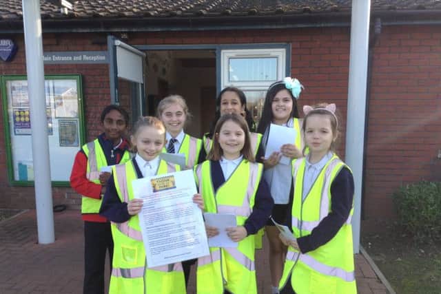 Pupils at Longthorpe Primary School with their leaflets