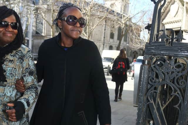 Disgraced MP Fiona Onasanya (right) arrives outside The Royal Courts of Justice for her conviction challenge with an unidentified woman  The Peterborough MP was jailed for three months after being found guilty of perverting the course of justice by lying to police to avoid a speeding charge. PRESS ASSOCIATION Photo. Picture date: Tuesday March 5, 2019. See PA story COURTS Onasanya. Photo credit should read: Yui Mok/PA Wire EMN-190503-110553001