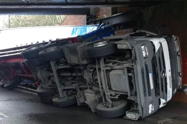 The HGV crashed into Stuntney Bridge in Ely. Photo: SWNS