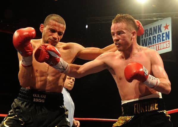 Curtis Woodhouse (left) in action against Frankie Gavin during  a WBO Intercontinental Welterweight Championship bout at the Liverpool Echo Arena, Liverpool, in  July 2011. Picture: Martin Rickett/PA Wire